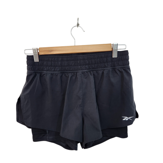 REEBOK | מכנסיים קצרים צבע שחור | לאישה מידה S